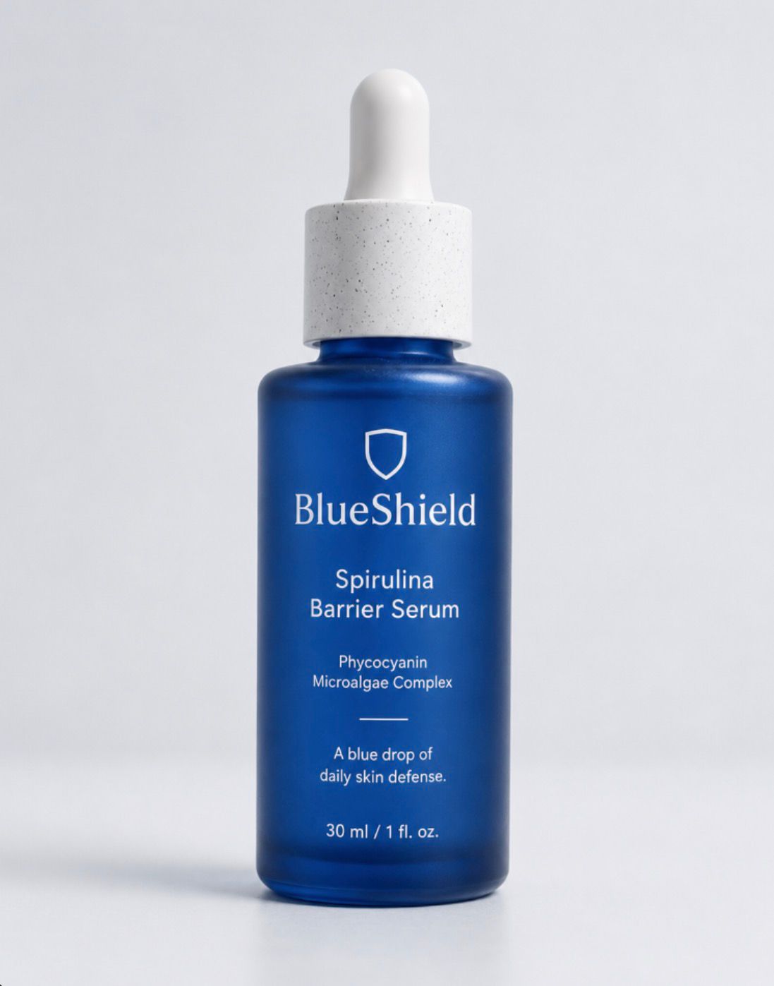 BlueShield Spirulina Barrier Serum cobalt blue glass dropper bottle